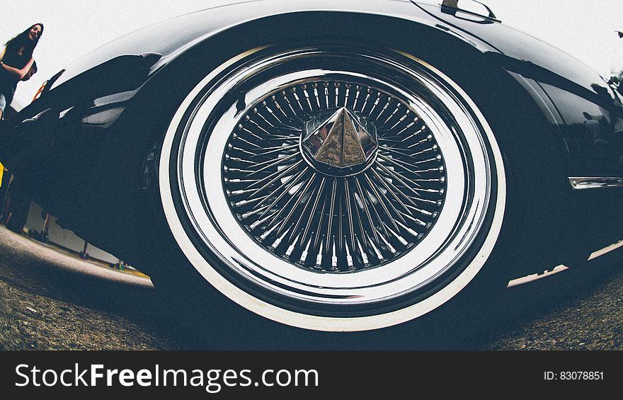 A closeup of a luxury automobile wheel