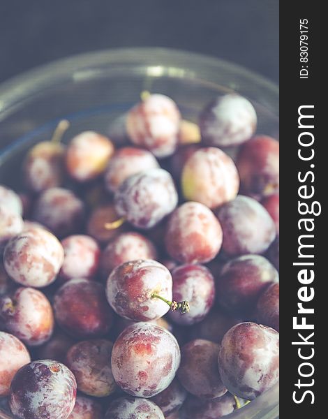 Grapes On Clear Glass Container