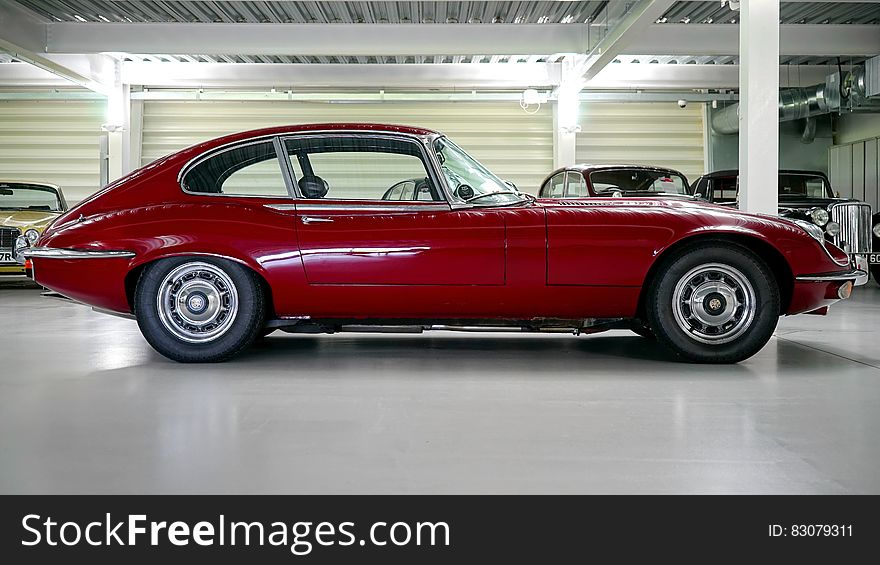 Black Red Classic Car In A Garage