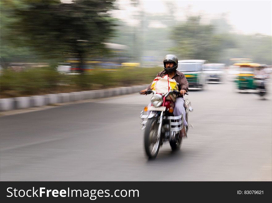 Man Riding on Motorcycle