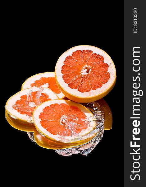 Still life  with ice and grapefruit