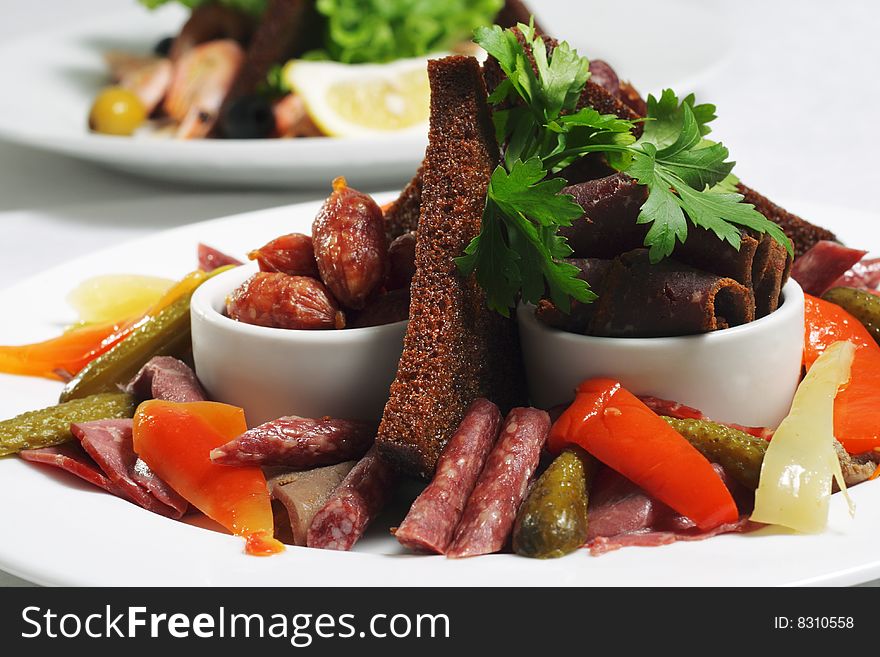 Sausages and Pickle Vegetables Served with Parsley and Toast. Sausages and Pickle Vegetables Served with Parsley and Toast