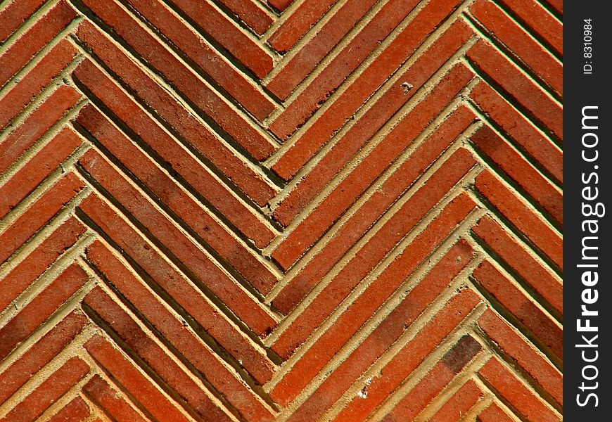 Red wall with a perpendicular pattern texture.