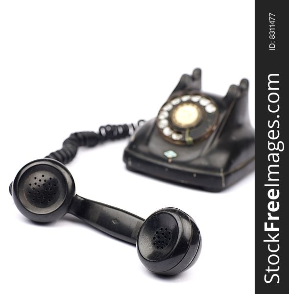 Old telephone in white background. Old telephone in white background