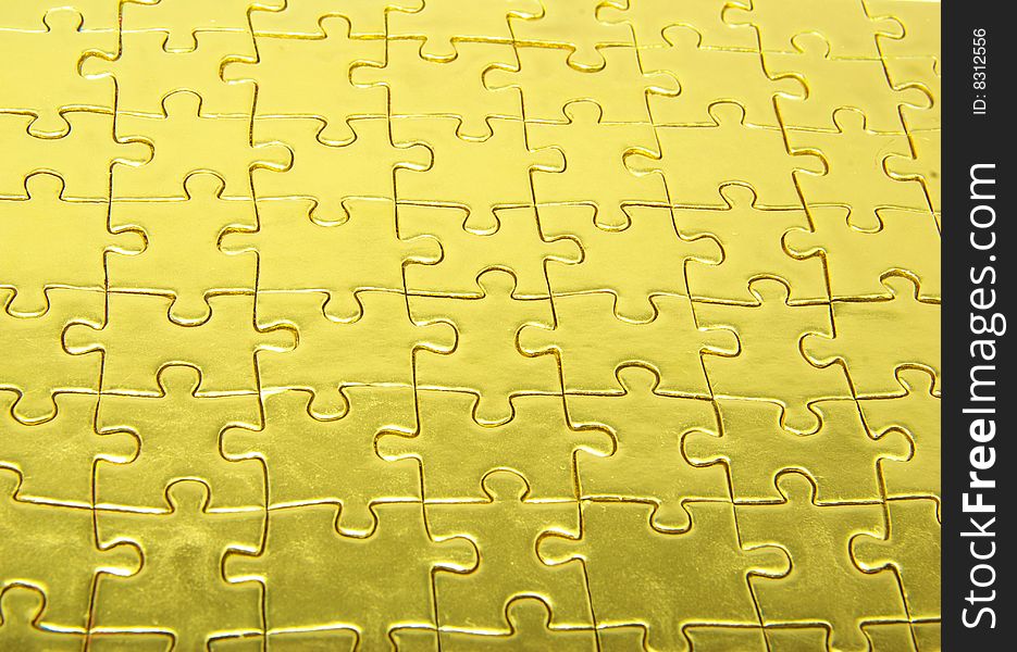 Background of gold jigsaw puzzle