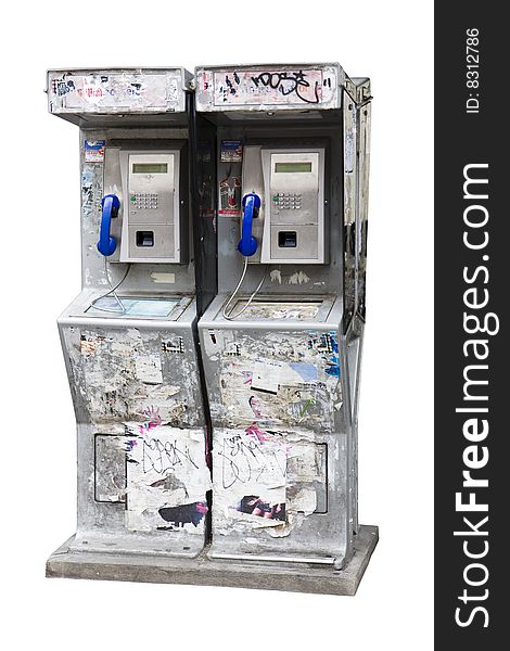 Payphones covered with graffiti and bills in Paris, France