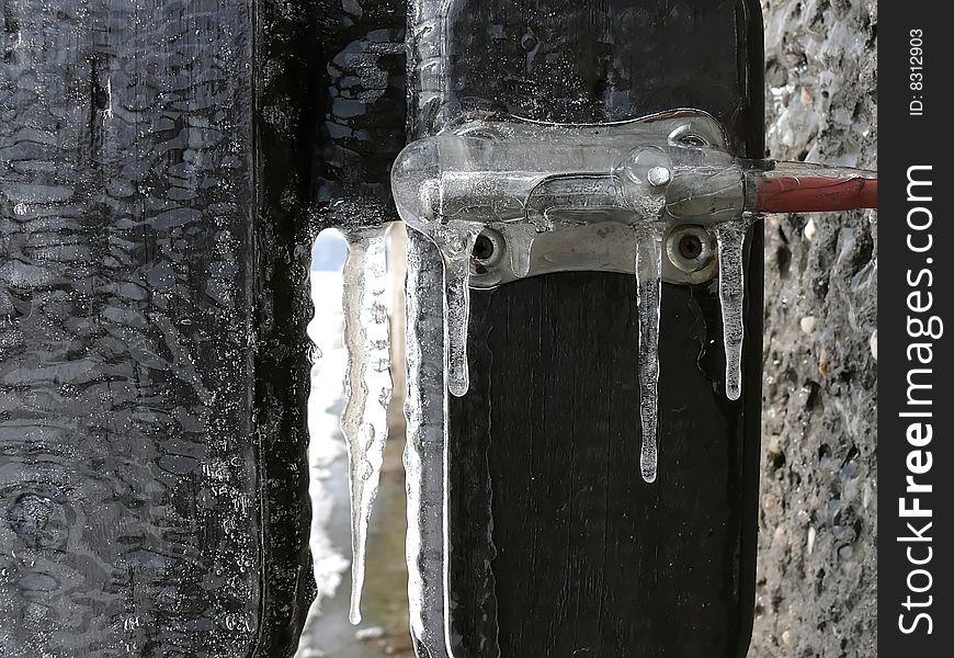 Icicles hanging on bolt, winter image