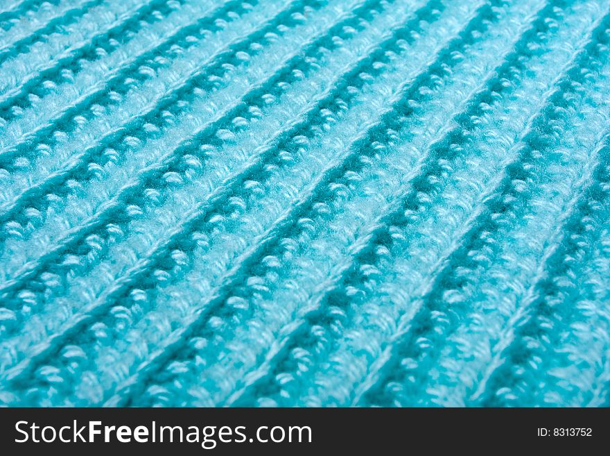 Blue knitted wool texture background