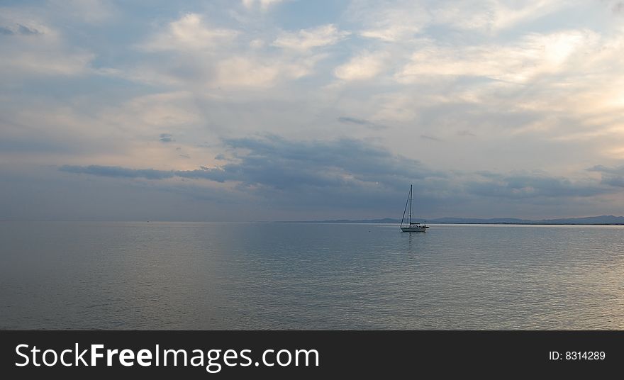 Yacht by the sea. Evening