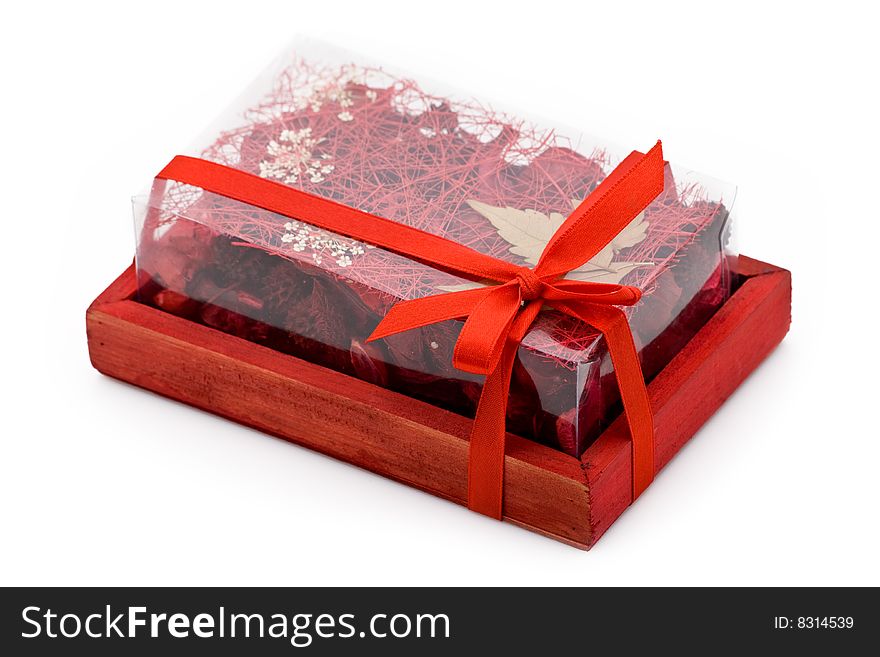 A gift box filled with potpourri isolated on a white background