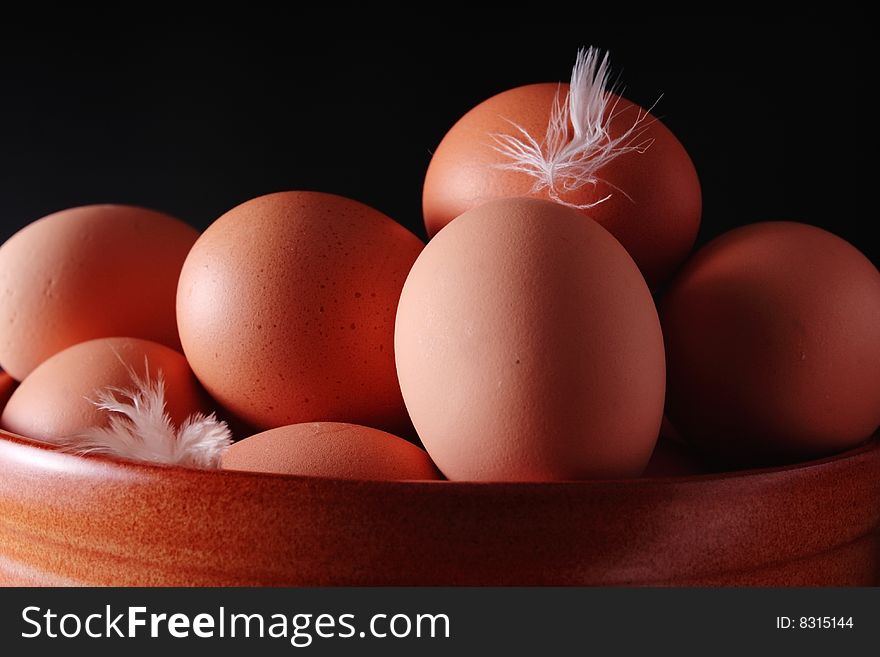 Eggs and small white feathers