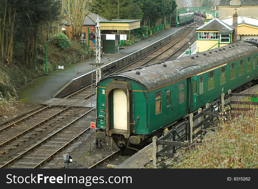 Restoration of a vintage train carriage in a station siding. Restoration of a vintage train carriage in a station siding