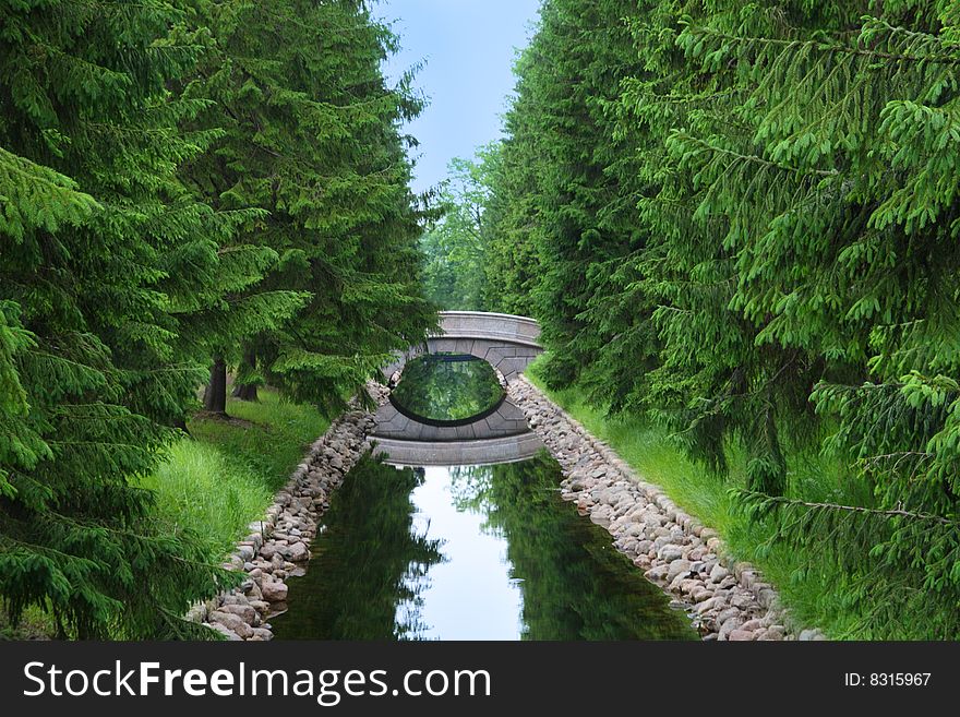 Bridge across stream in pushkin park saint-petrersburg russia