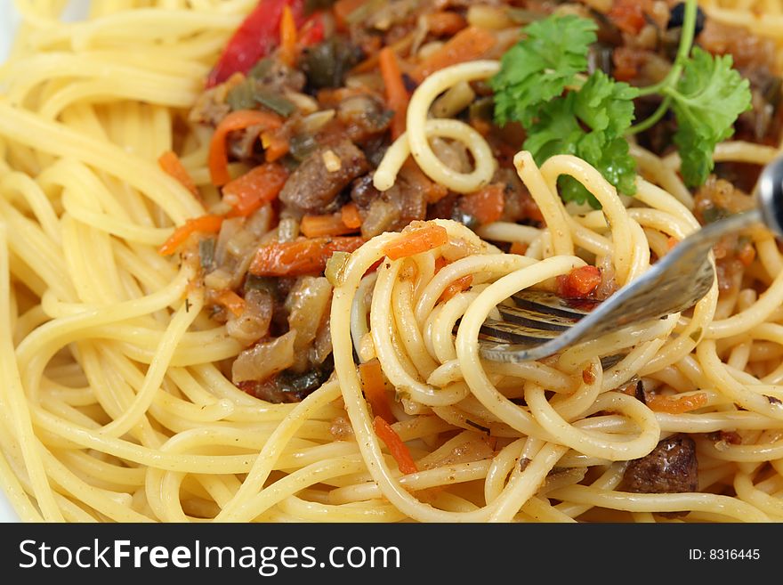 Dinner plate with spaghetti.