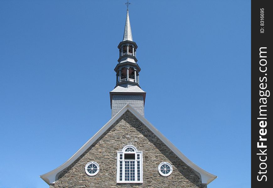 Stone church with high steeple