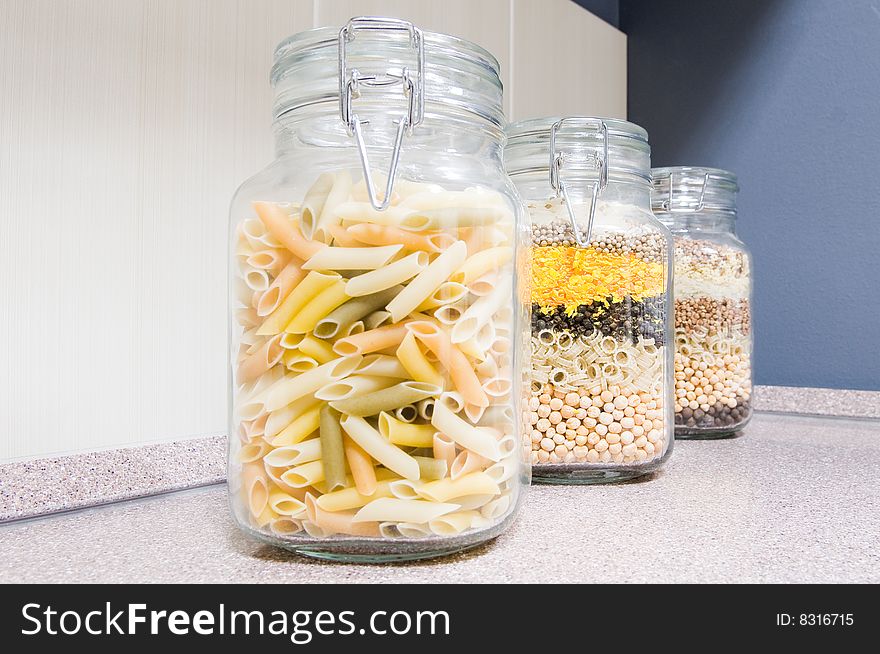 Pasta in glass jars, selective focus