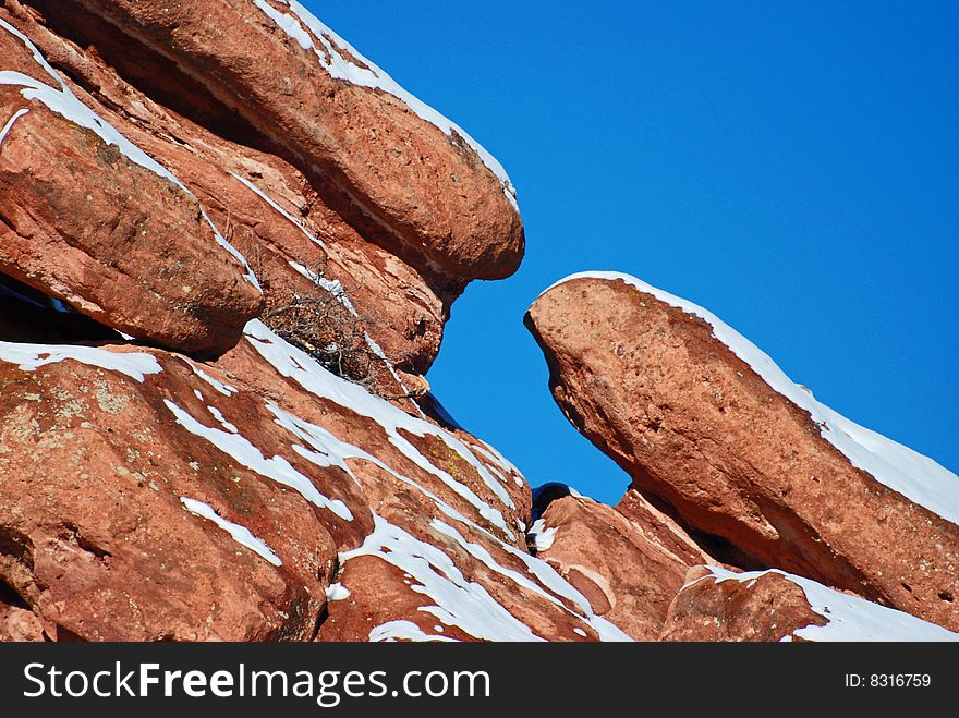 Diagonal Limestone Rock Formation Sprinkled In Sno