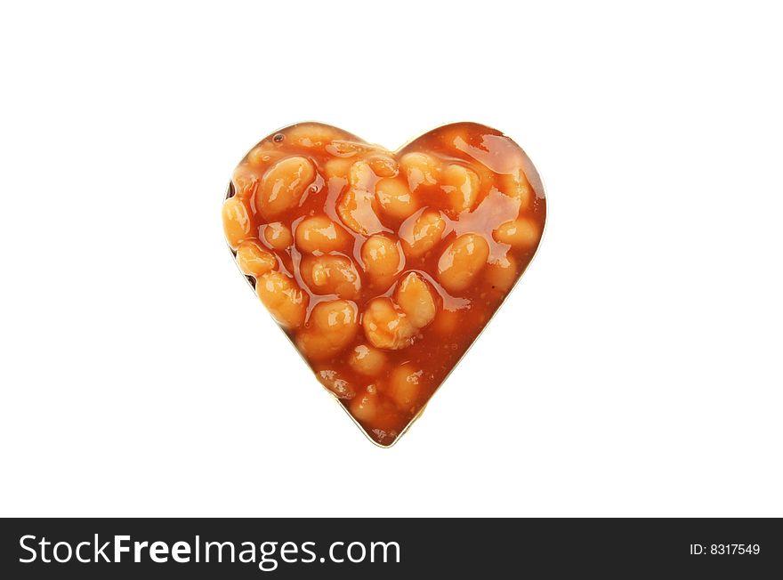 Baked beans in tomato sauce in a heart shape. Baked beans in tomato sauce in a heart shape