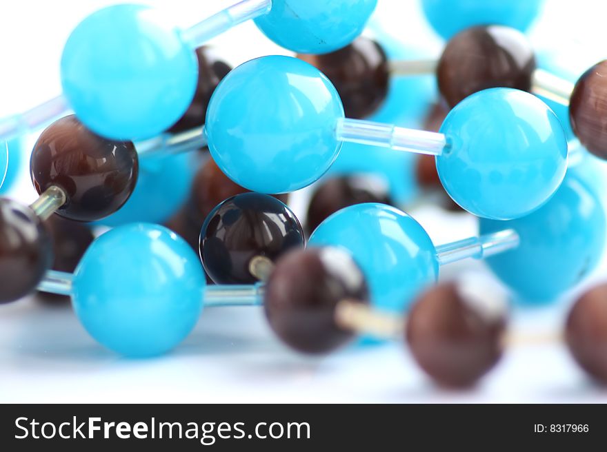 Close up of brown and blue strings of round beads. Close up of brown and blue strings of round beads