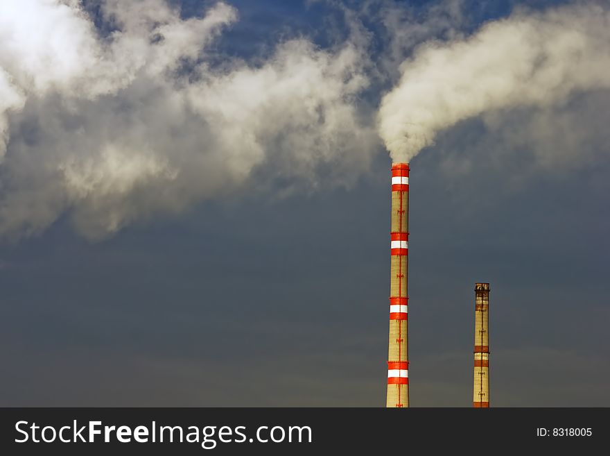 Exhaust and clouds of smoke in sky. Exhaust and clouds of smoke in sky