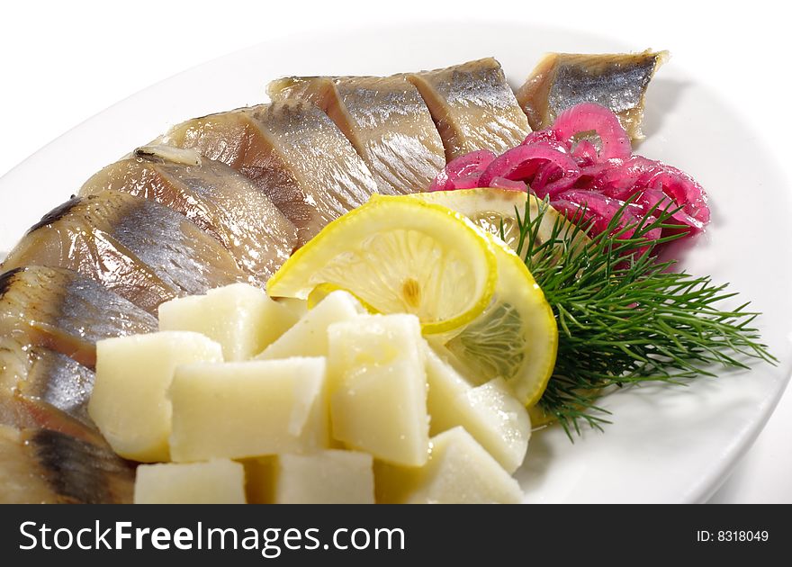 Red Herring with Lemon and Onion and Potato