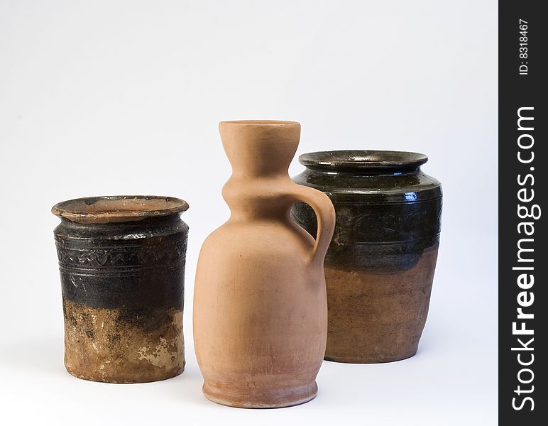 Three clay vases on white background. Three clay vases on white background