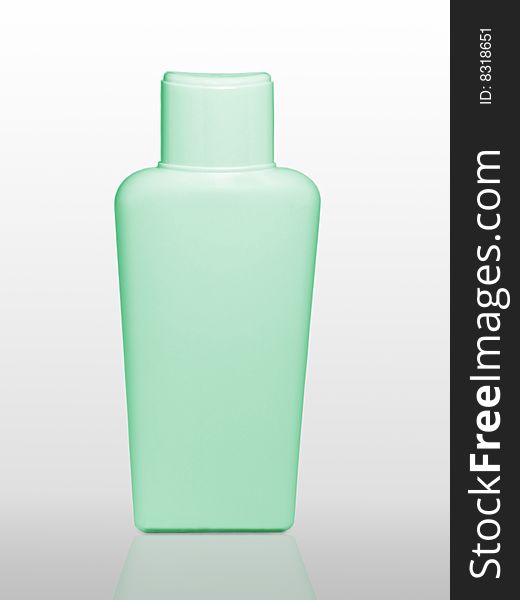 Light green bottle shampoos on a white background