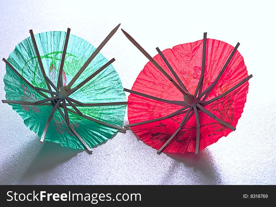 Red and green umbrella for cocktail