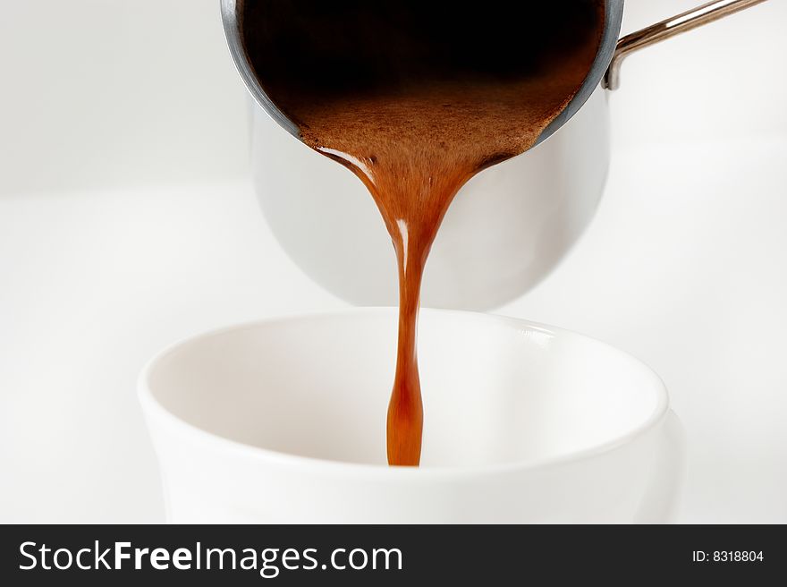 Pouring a Fresh Cup of Brewed Coffee. Pouring a Fresh Cup of Brewed Coffee