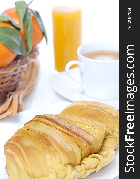 Cup of coffee, croissant and orange juice. Cup of coffee, croissant and orange juice