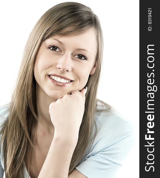 Closeup portrait of a happy young woman smiling isolated on white background