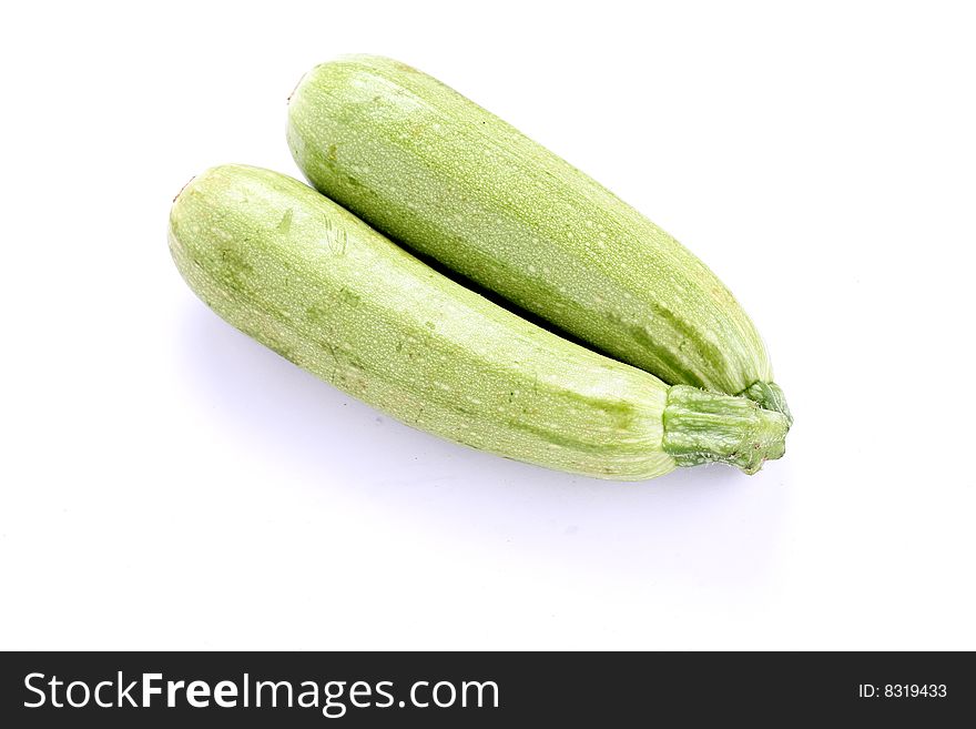 Fresh zucchini isolated on white background