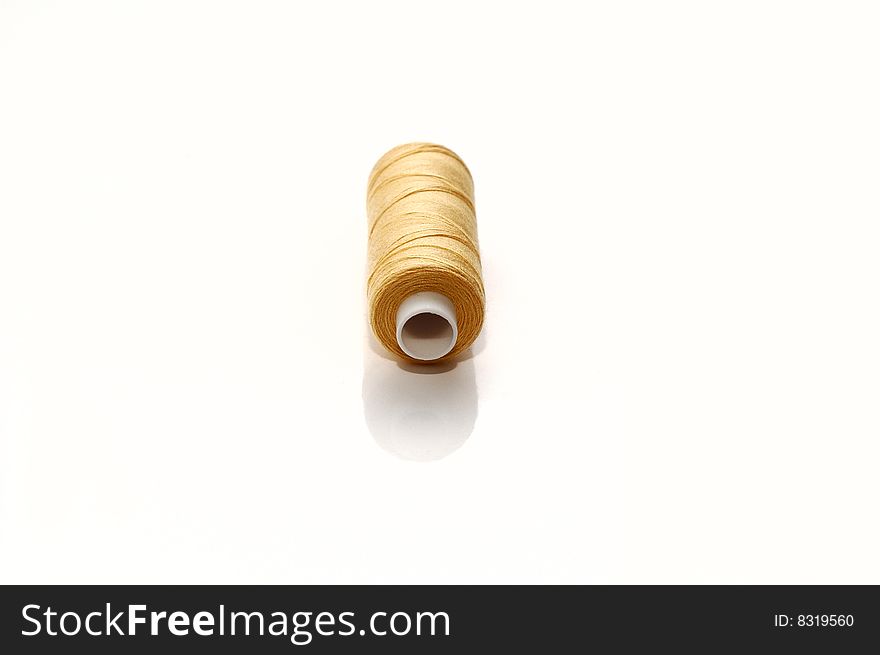 Yellow Spool Of Sewing Threads