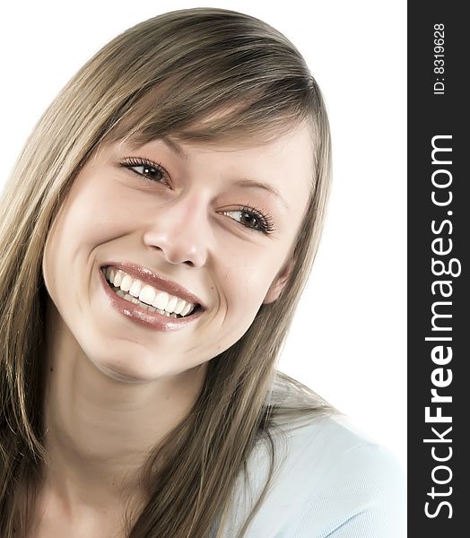 Closeup portrait of a happy young woman smiling isolated on white background