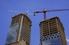 Construction Cranes On Twin Highrise Towers Stock Photography Construction Cranes On Twin Highrise Towers Stock Photography