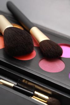 Make-up Brushes And Colors Stock Photos