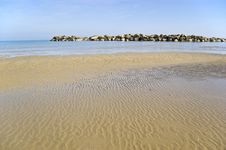 Beach With A Stone Wall Royalty Free Stock Photography Beach With A Stone Wall Royalty Free Stock Photography