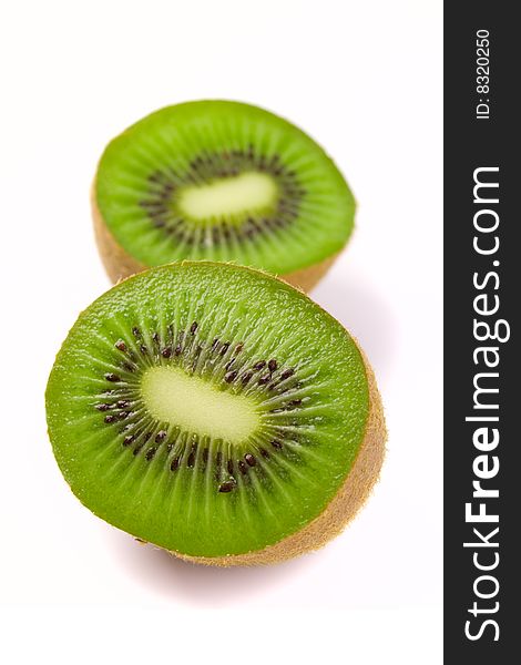 Kiwi halves on white background