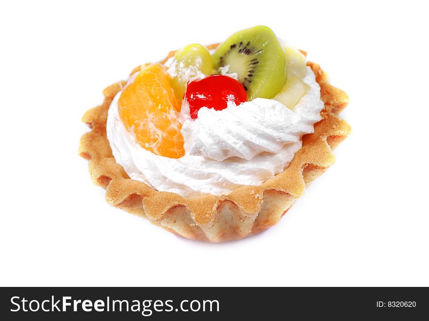 Cupcake with cream and fruits on white background