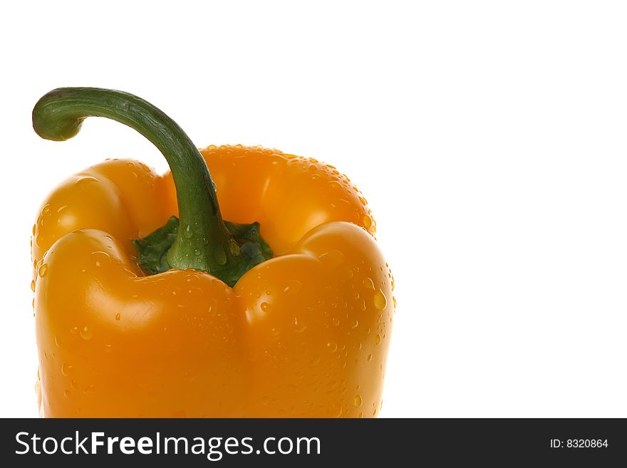 Yellow pepper and drops of water on a white background. Yellow pepper and drops of water on a white background.