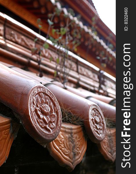 Traditional Chinese roof tiles in a temple in Kunming, China