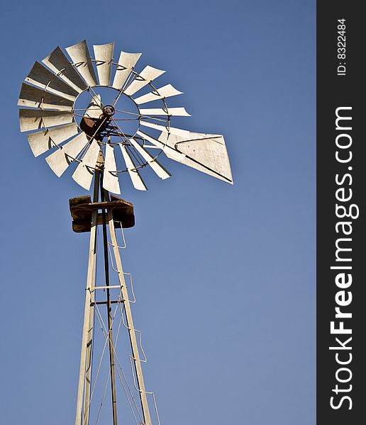 An electricity gathering windmill in California