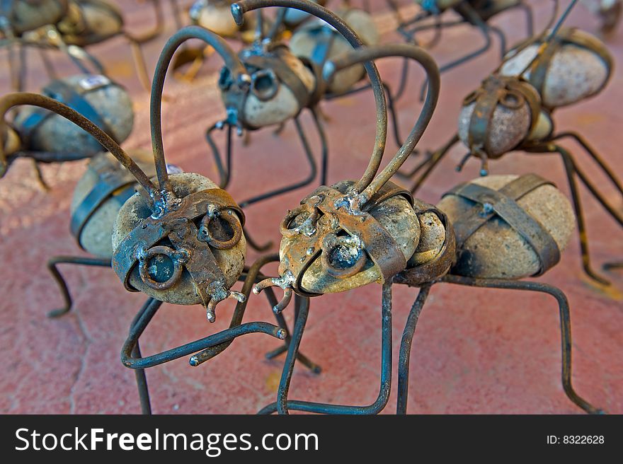 Ants made of stone and welded metal. Ants made of stone and welded metal