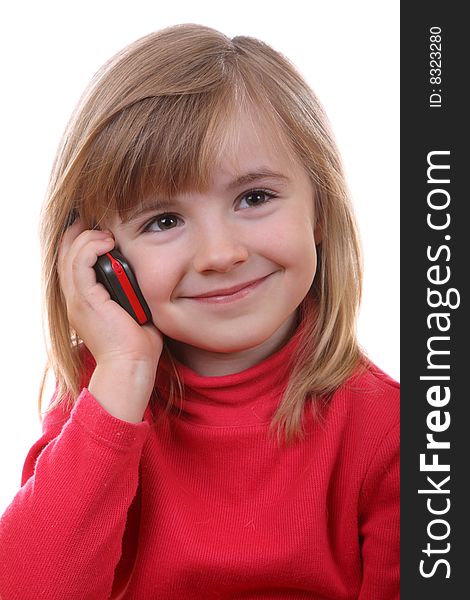 The beautiful young girl speaks by phone