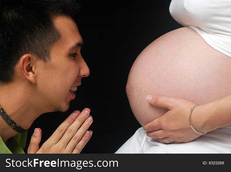 Happy asian couple expecting newborn. Happy asian couple expecting newborn