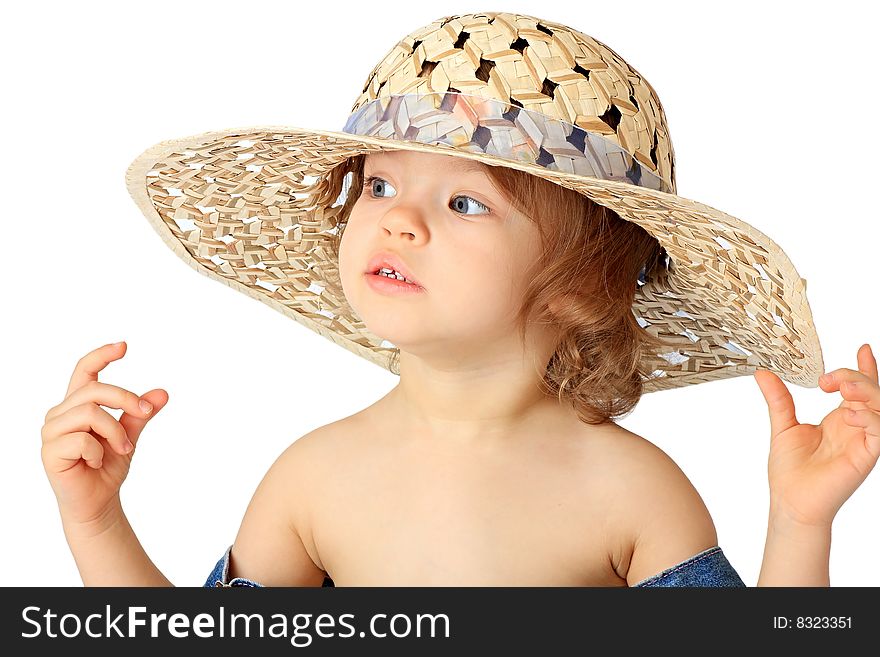 A little girl is in a straw hat. A little girl is in a straw hat.