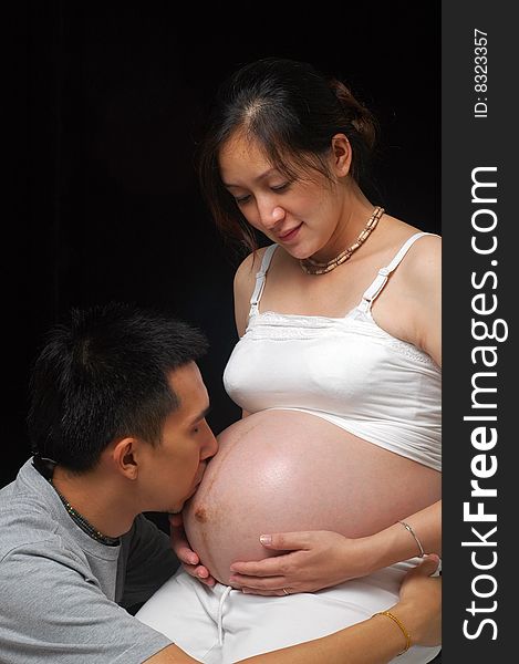 Happy couple expecting newborn