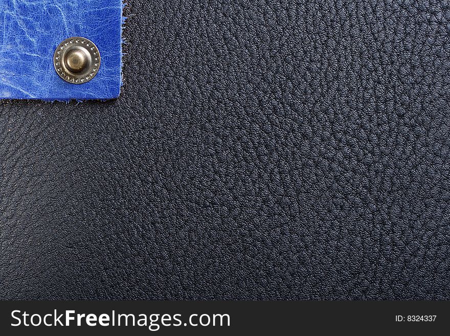 Black and blue leather and one button.
Macro texture, good details. Black and blue leather and one button.
Macro texture, good details.