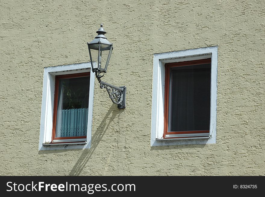 Two windows with street lamp