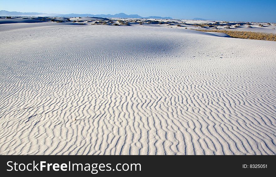 View of a rippled sand dune in the White Sands of New Mexico. View of a rippled sand dune in the White Sands of New Mexico.